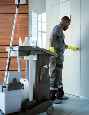 full-shot-man-cleaning-doorknob